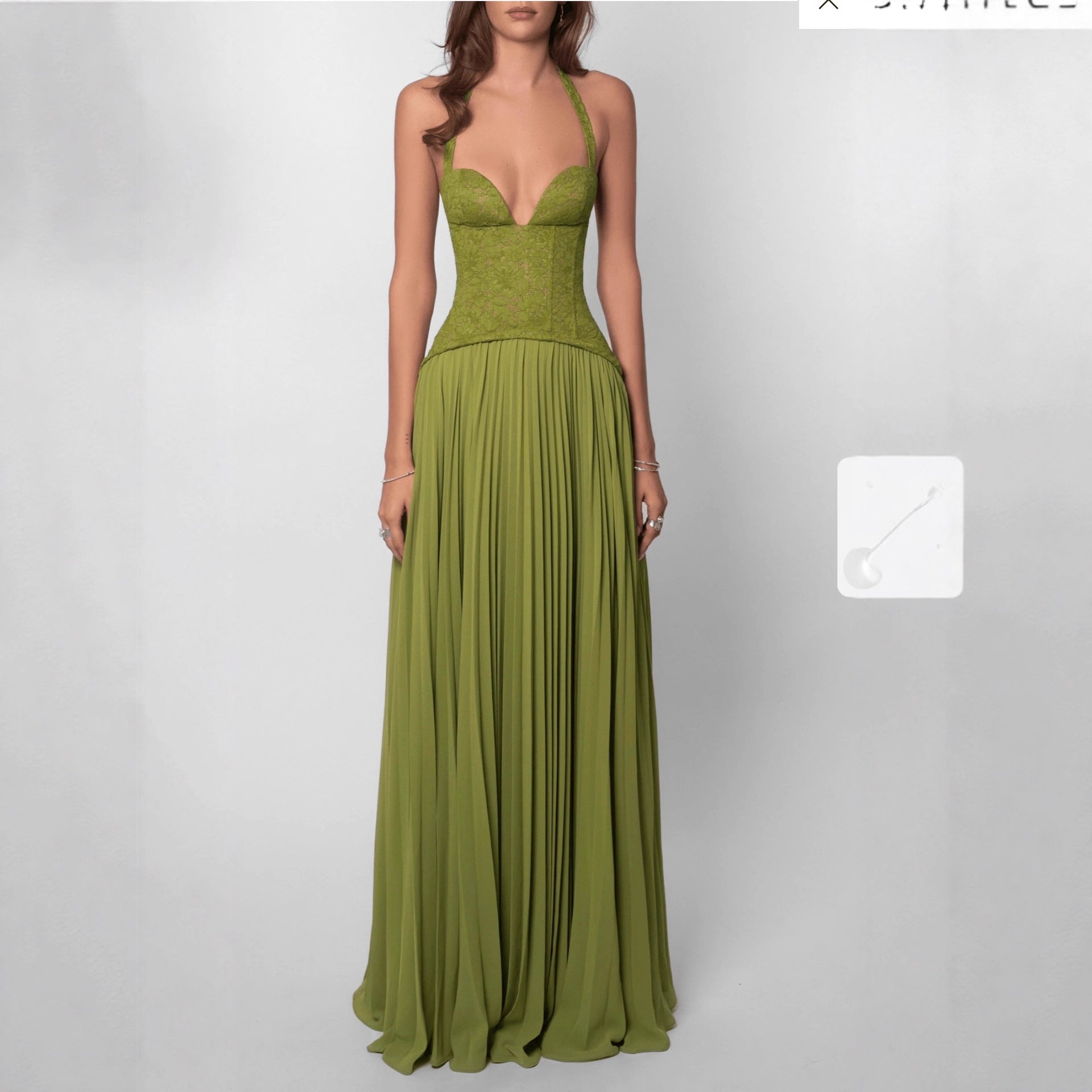 The Plunge Halter Gown by Marlowe House. Halter neck, a low-cut plunge, backless, and pleats that fall the full length. Understated on the.