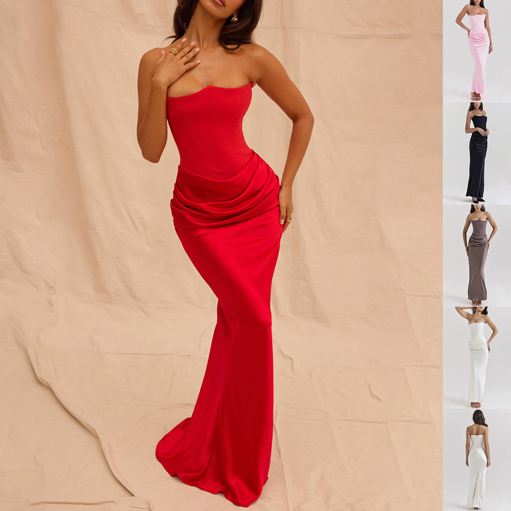 The Column Gown by Marlowe House. Backless. Bandeau. Floor-length column that skims rather than clings. The dress that makes an.