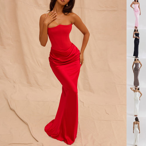 The Column Gown by Marlowe House. Backless. Bandeau. Floor-length column that skims rather than clings. The dress that makes an.